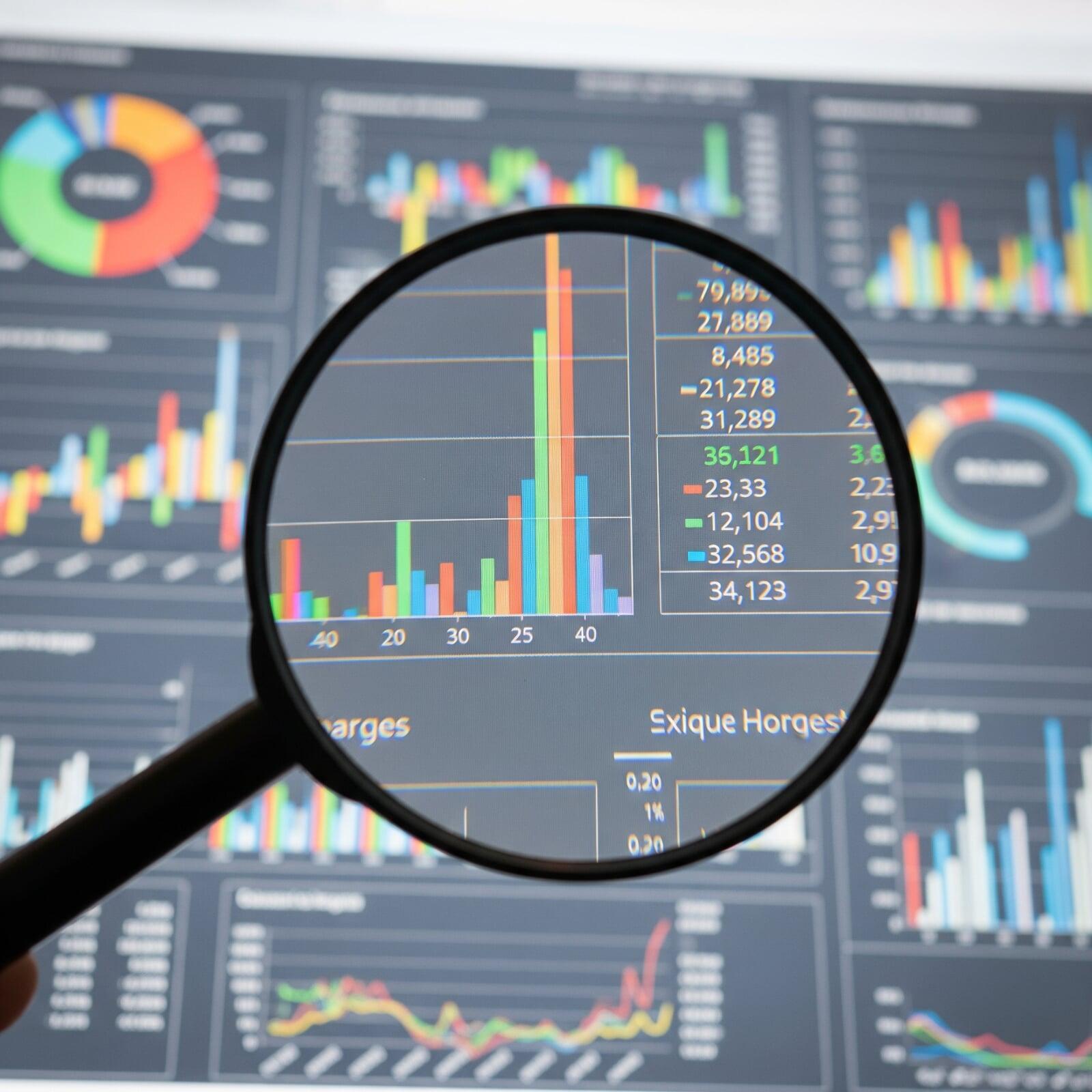 Magnifying Glass Looking at Analytics